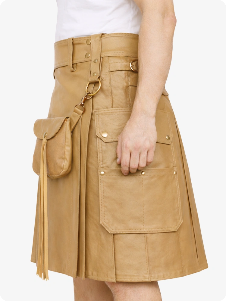 Tan leather kilt with gold buttons on a white background