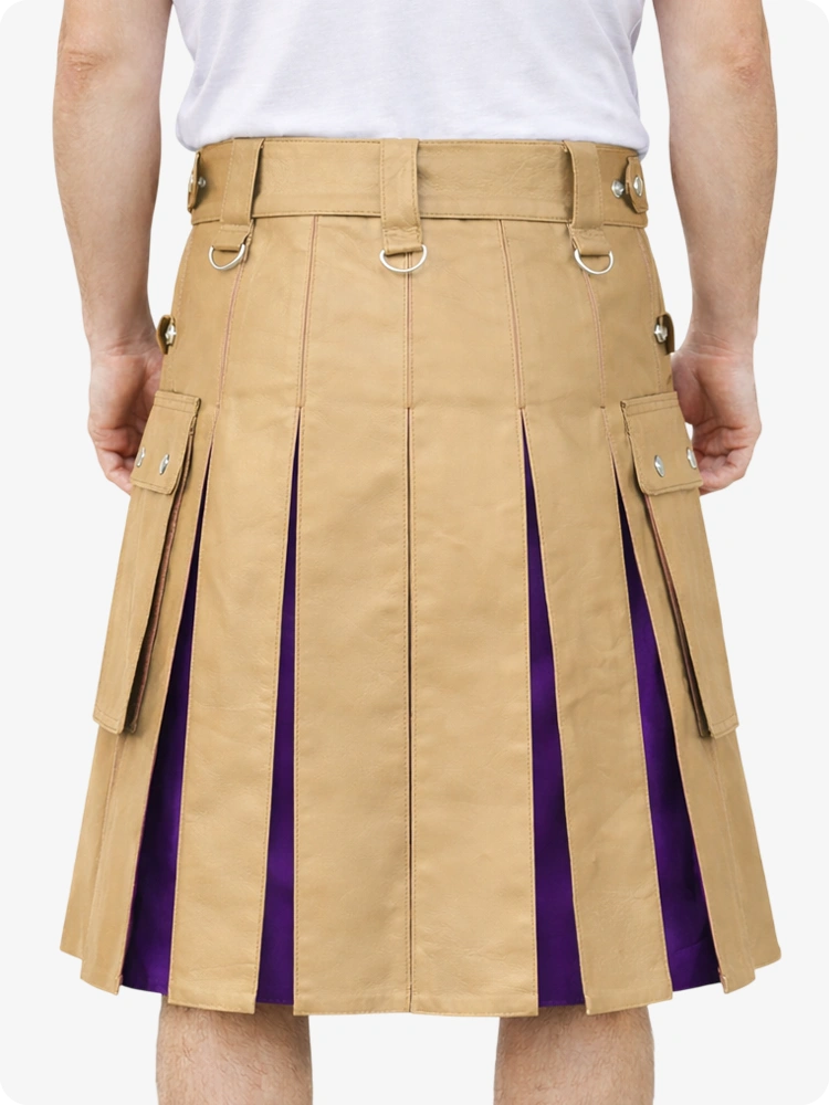 Tan kilt with purple lining worn by a person on a white background