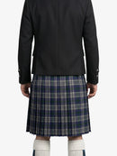 Person wearing a black jacket and plaid kilt on a white background