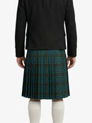 Person wearing a black jacket and green plaid kilt on a white background