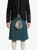 Person wearing a traditional Scottish kilt with a jacket on a white background