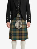 Person wearing a traditional Scottish kilt with a jacket on a white background