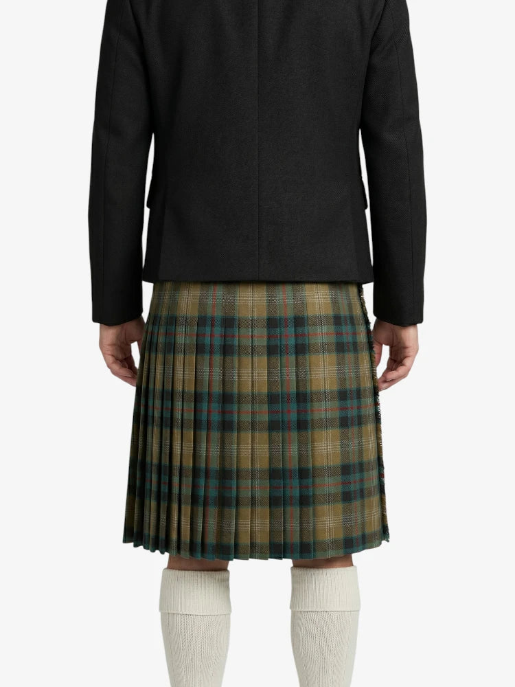 Person wearing a black jacket and plaid skirt on a white background