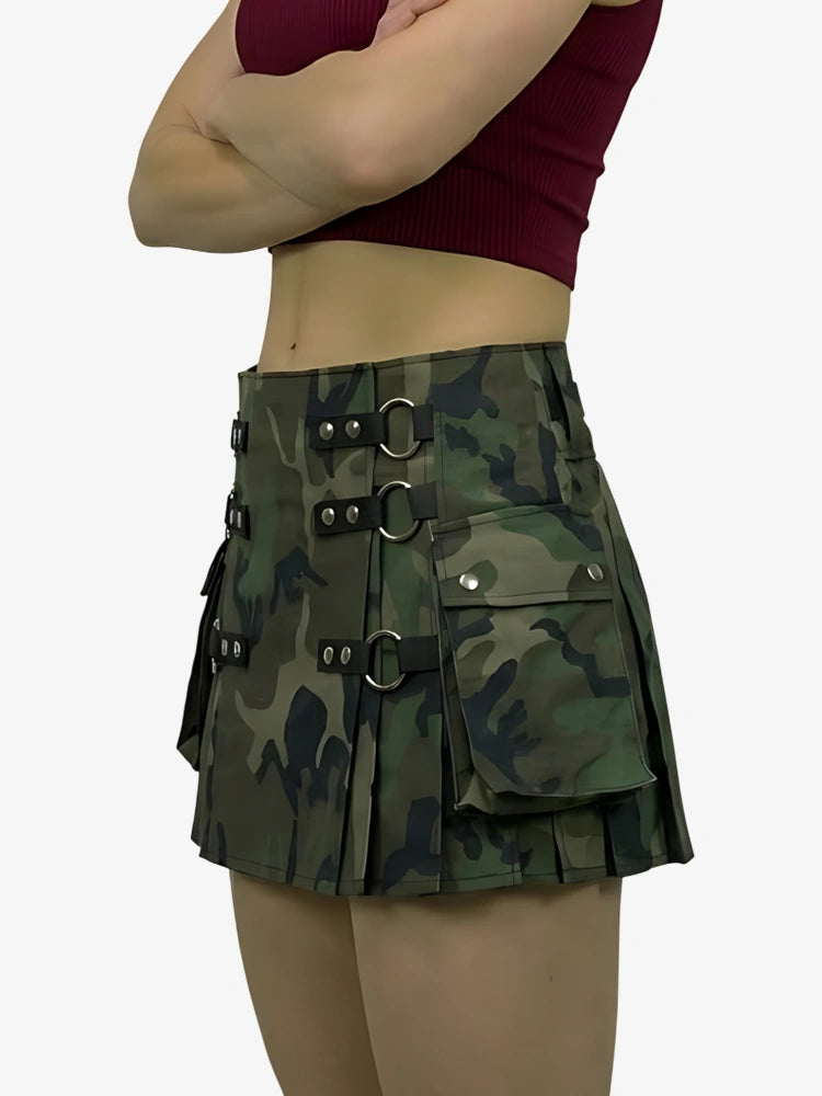 Camouflage skirt with metal buckles worn by a person on a white background